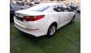 كيا أوبتيما خليجي 2014 لون ابيض داخل بيج رقم 2 رنجات  أنوار ضباب راديو FM مثبت سرعه حساسات لاتحتاج الي مصاريف