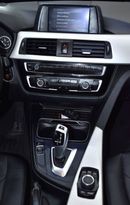 BMW 318i EXCELLENT DEAL for our BMW 318i ( 2018 Model ) in Blue Color GCC Specs