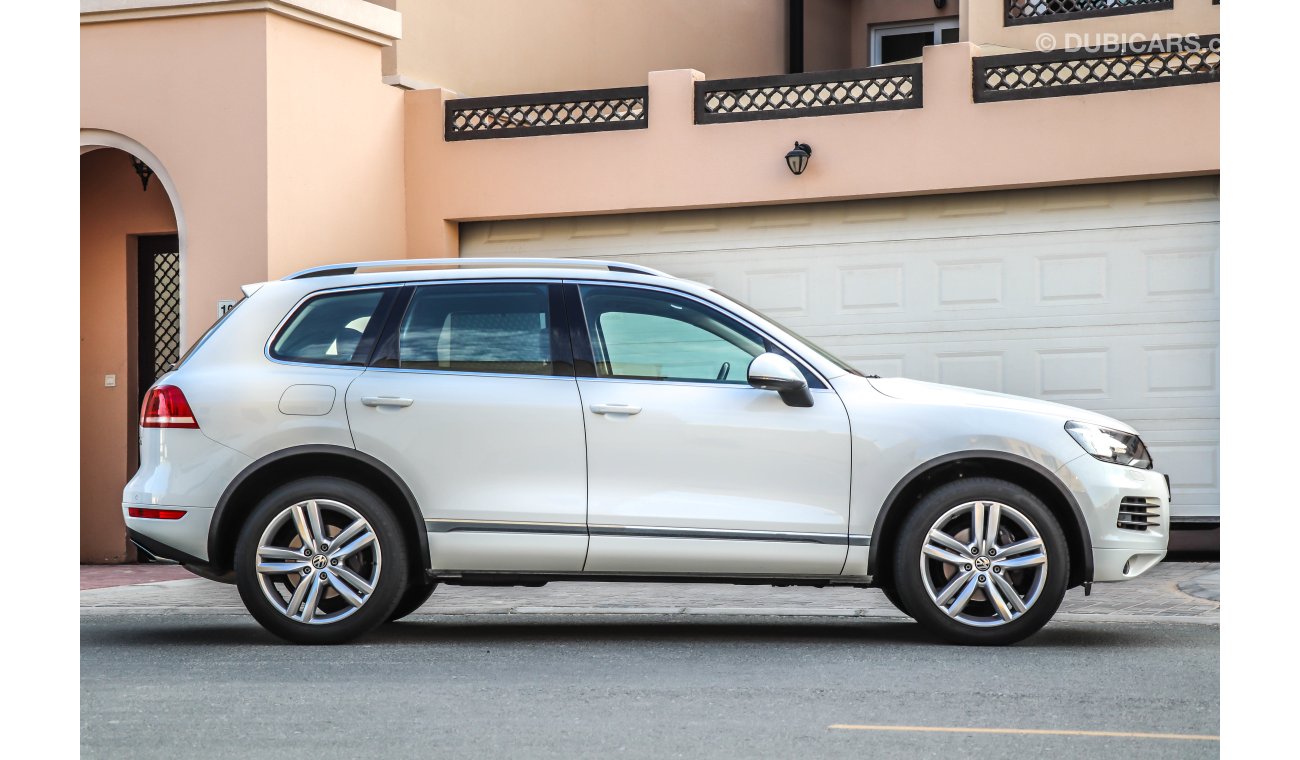 Volkswagen Touareg Sport 2013 GCC under 2 years Warranty with Zero downpayment.