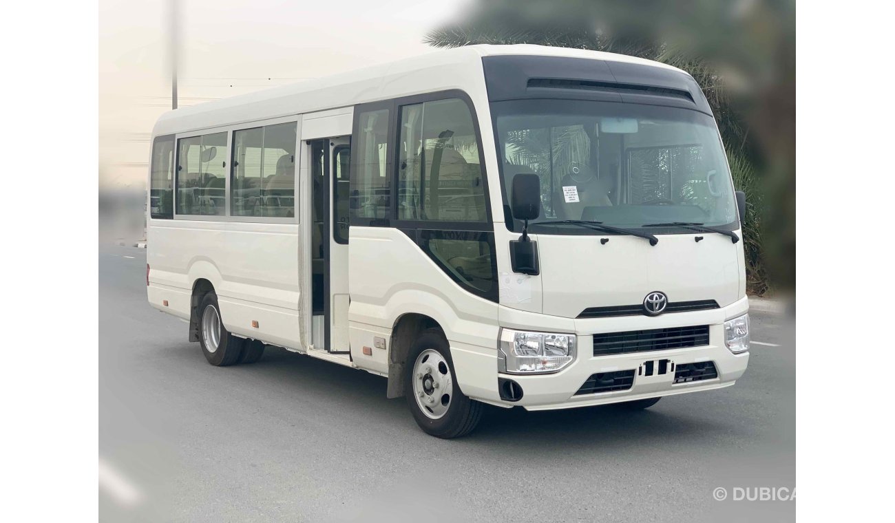 Toyota Coaster FULL OPTION — V6 — 4200cc — DIESEL—22 SEAT -- 3 POINT SEAT BILT - LUGGAGE RACK - CURTAINS - FRIDGE