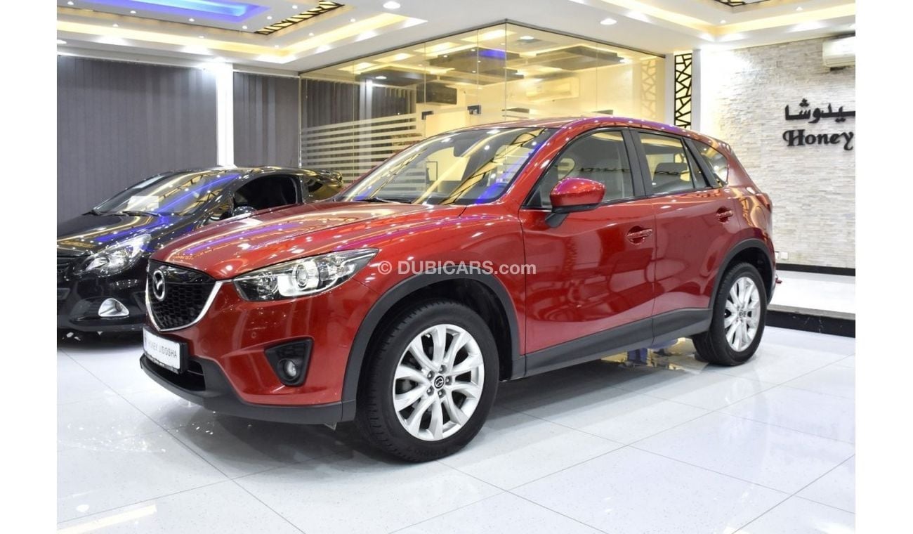 Mazda CX5 EXCELLENT DEAL for our Mazda CX-5 AWD ( 2014 Model ) in Red Color GCC Specs