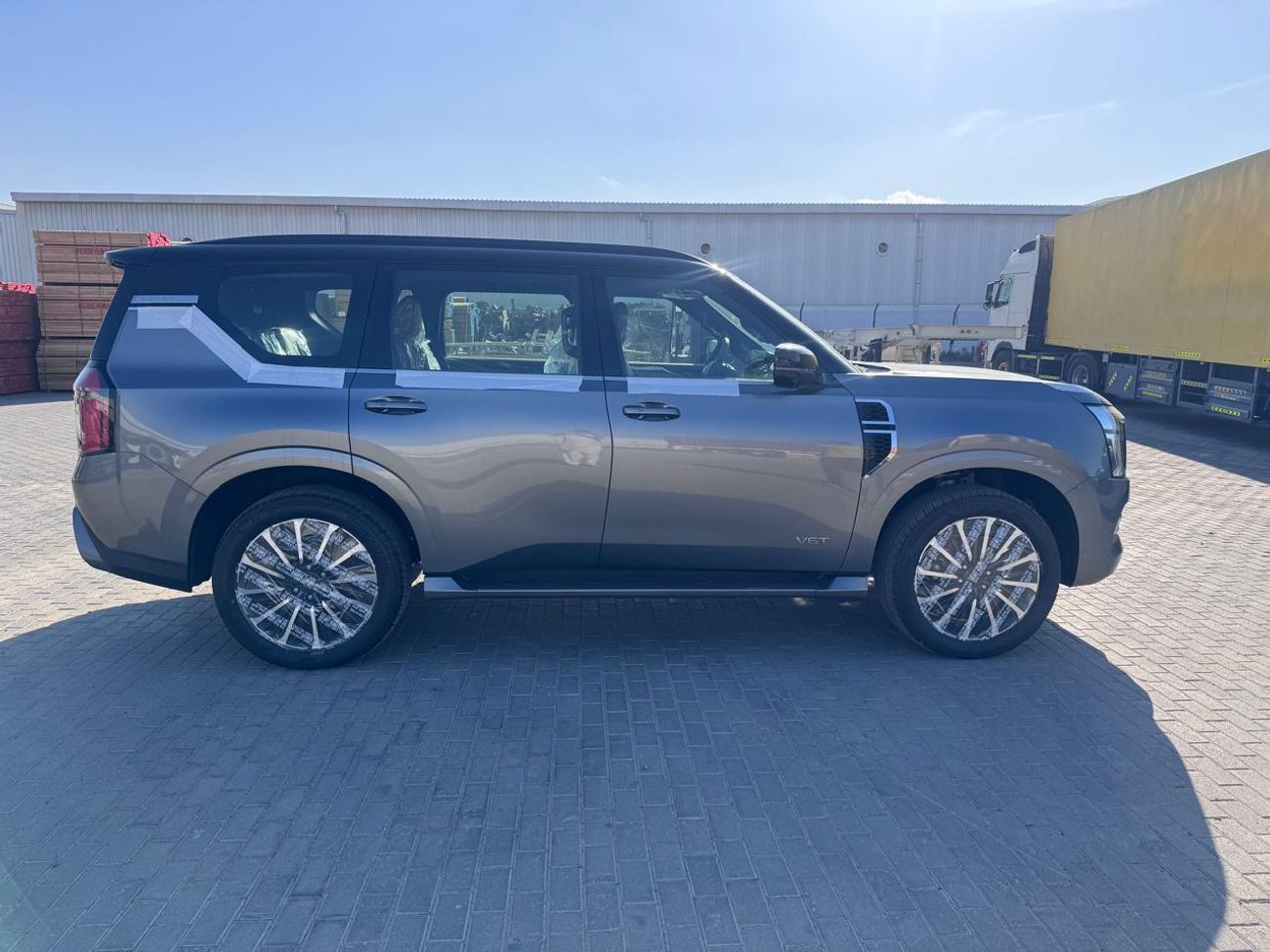 Nissan Patrol LE PLATINUM CITY 3.5L_ 2026_ (GREY/TAN)