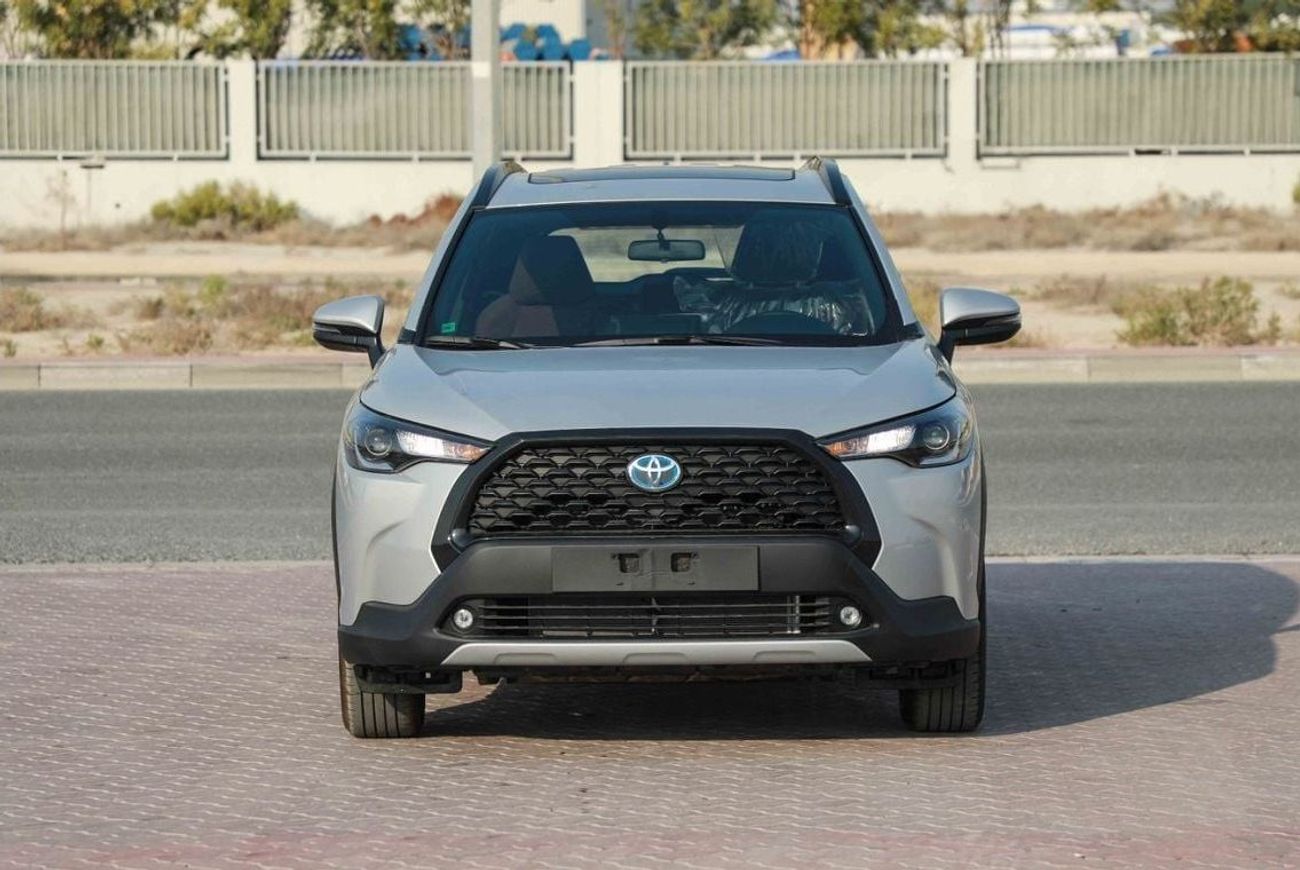 تويوتا كورولا كروس 2024 TOYOTA COROLLA CROSS 1.8 Hybrid MID - SILVER inside RED | Export Only