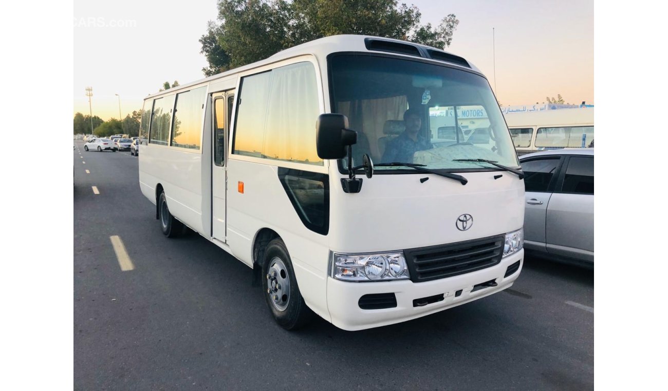 Toyota Coaster 30 Seater - Full Air Condition - Clean interior & exterior - Special price for ANGOLA