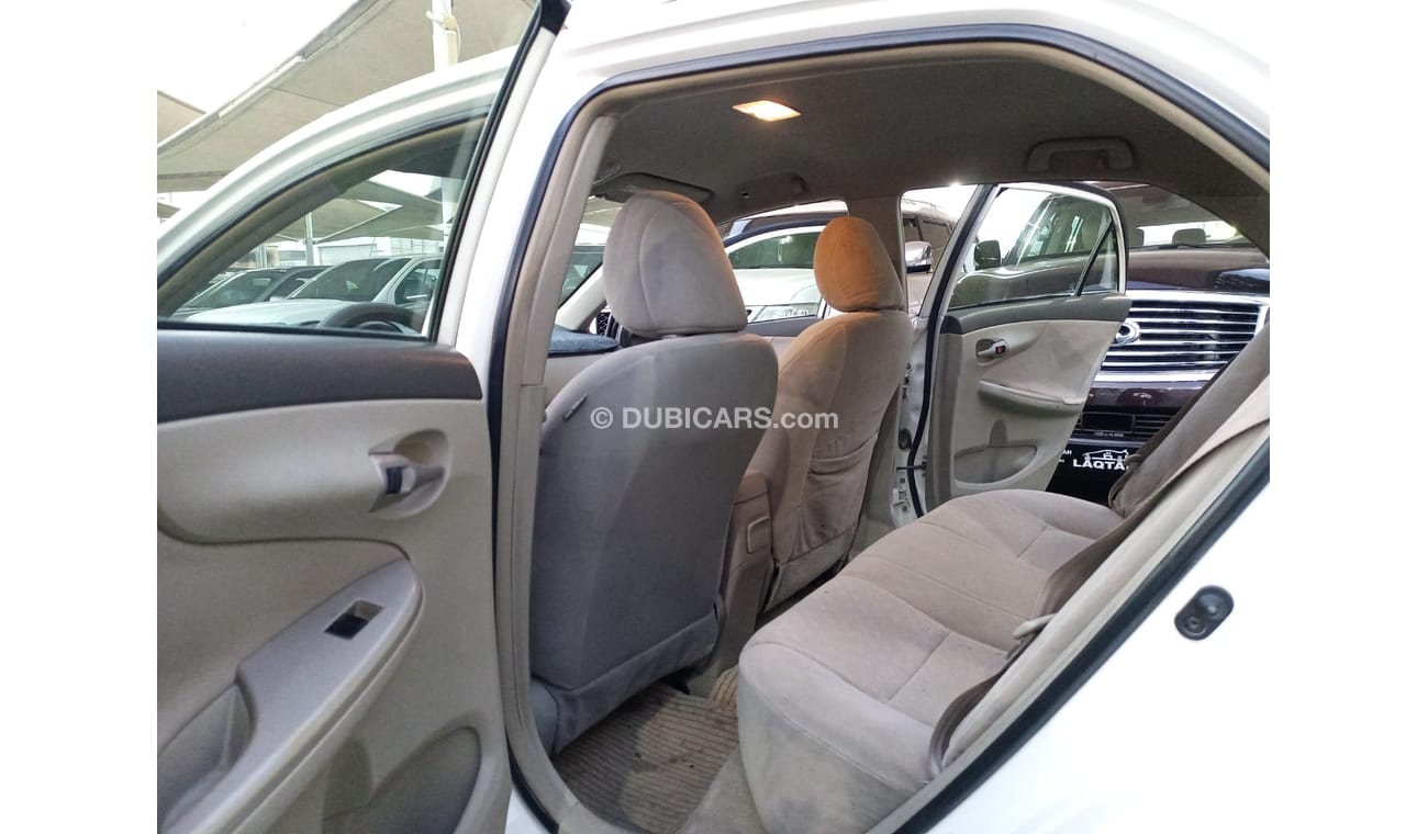 تويوتا كورولا موديل 2013 خليجى 1600 CC لون ابيض داخل بيج بدون حوادث بحالة ممتازة لاتحتاج لأى مصاريف