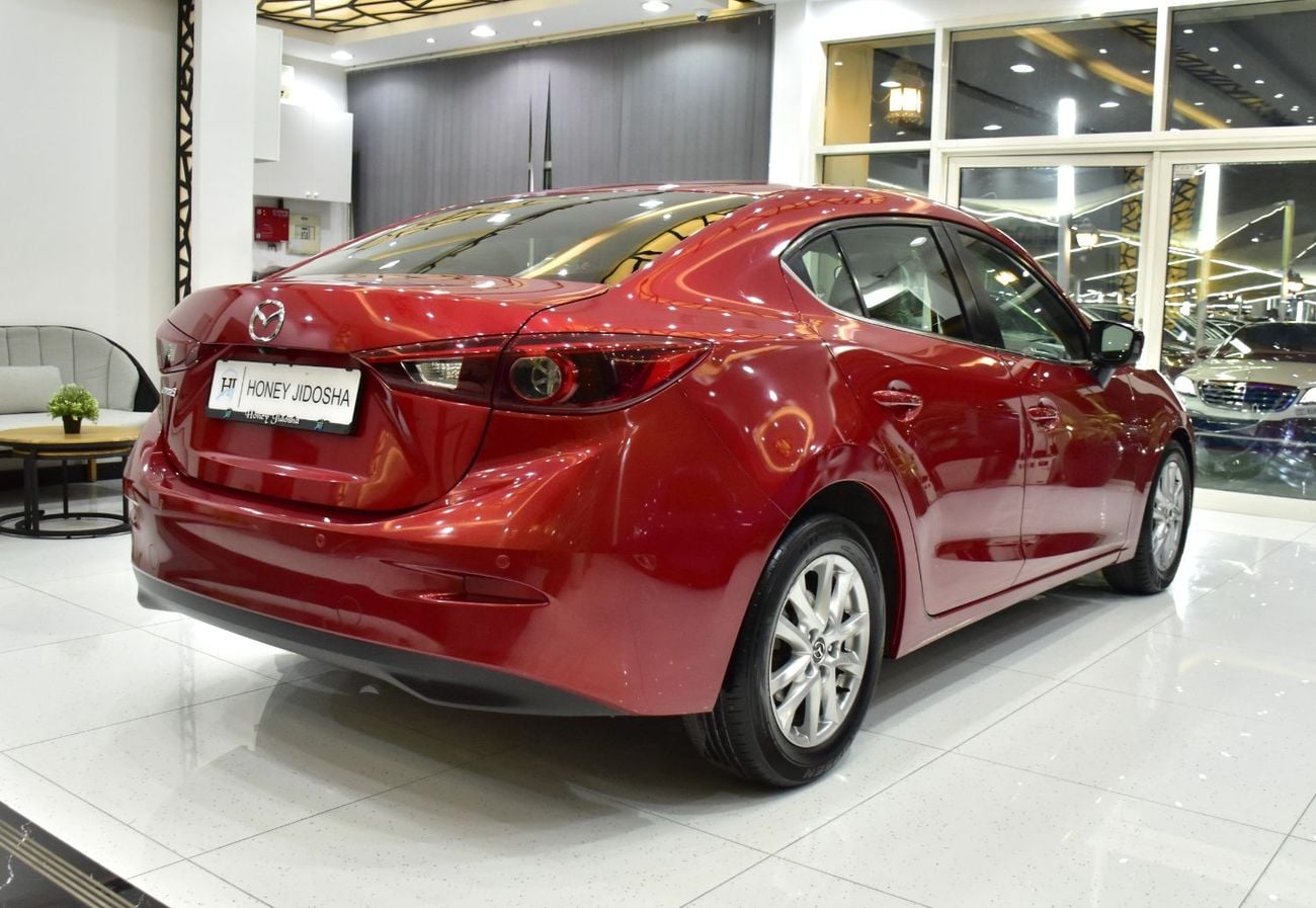 Mazda 3 EXCELLENT DEAL for our Mazda 3 ( 2015 Model ) in Red Color GCC Specs
