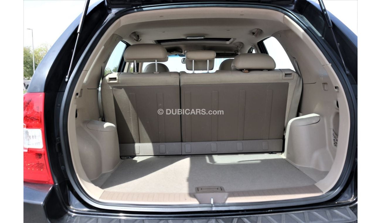 كيا سبورتيج كيا سبورتاج 2009 خليجي فل اوبشن جلد و فتحه فورويل 2700 سي سي