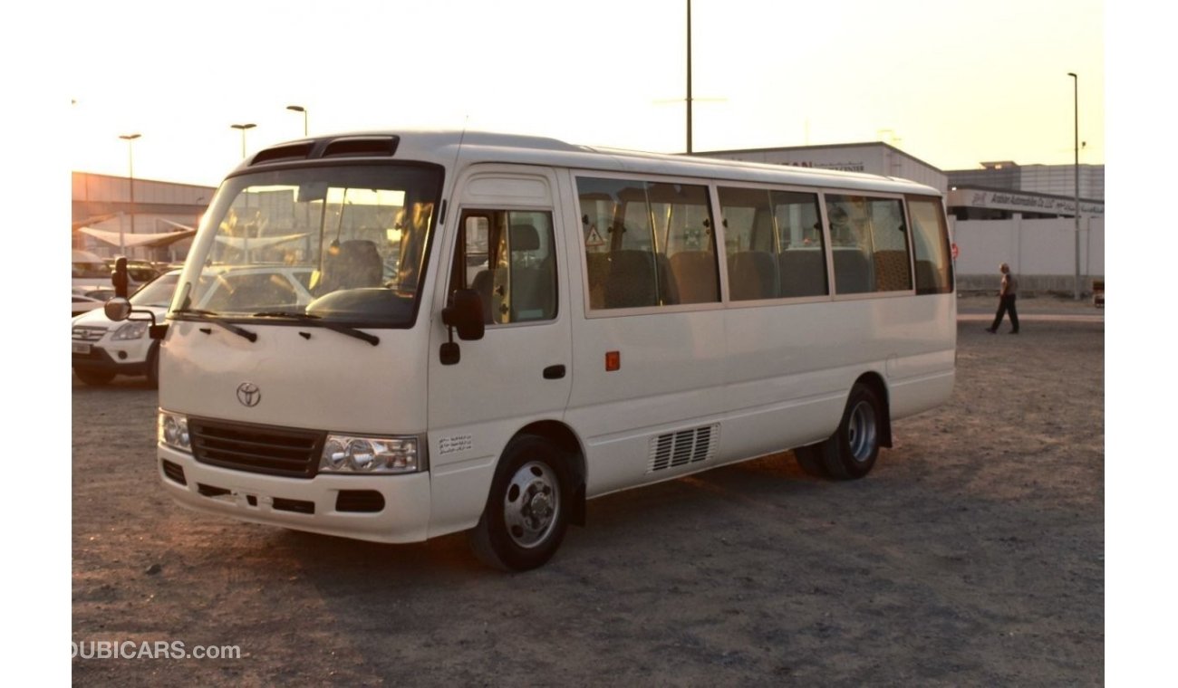 تويوتا كوستر 2016 | TOYOTA COASTER STD ROOF PETROL GLS | 2.7L 30-SEATER V4 | GCC | VERY WELL-MAINTAINED | SPECTAC