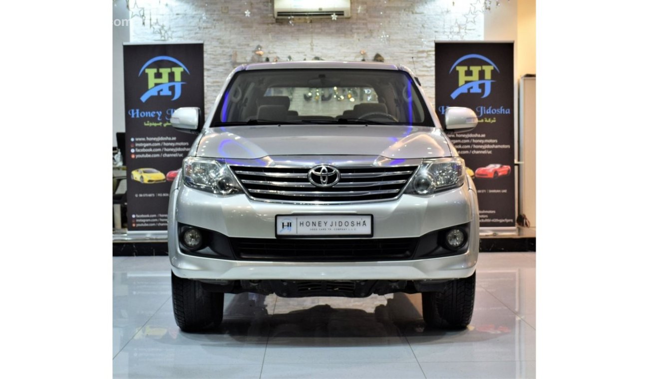 تويوتا فورتونر EXCELLENT DEAL for our Toyota Fortuner SR5 ( 2013 Model! ) in Golden Color! GCC Specs