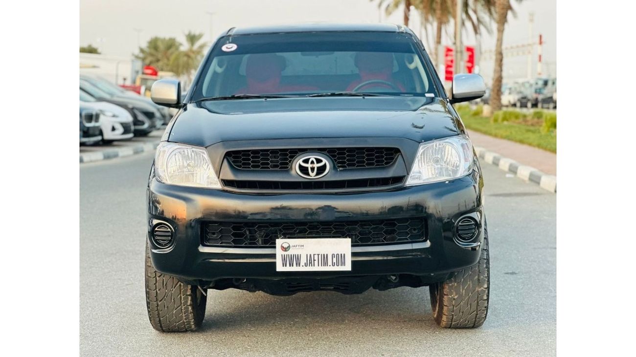 Toyota Hilux DOUBLE CABIN | PREMIUM SPORTS BAR WITH BASKET | 2009 | 2.7L PETROL | LHD | MANUAL | RED INTERIOR