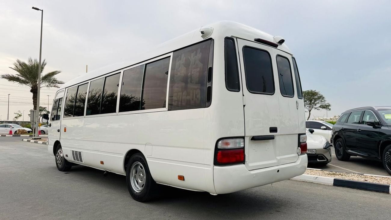 Toyota Coaster Fully luxury seats fully covered by cameras