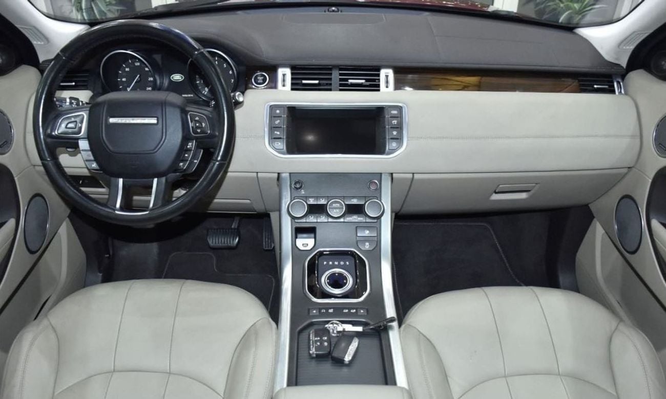 Land Rover Range Rover Evoque HSE EXCELLENT DEAL for our Land Rover Range Rover Evoque ( 2016 Model ) in Red Color GCC Specs