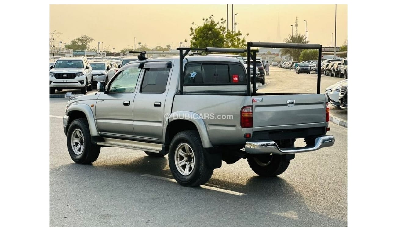 Toyota Hilux 2002 | PETROL AT 2.7L V4 [ROOF RACK] (KEY START) SIDE STEPS | VERY CLEAN VEHICLE | GOOD CONDITION