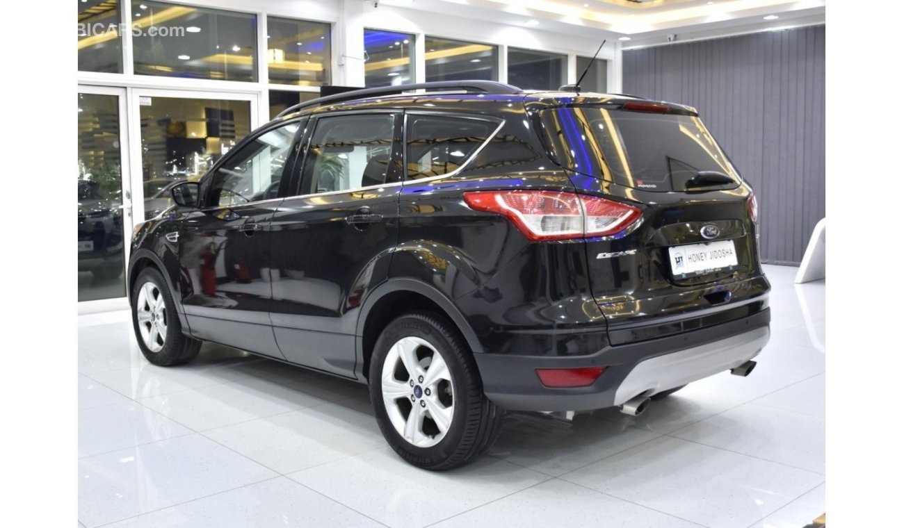 Ford Escape EXCELLENT DEAL for our Ford Escape SE Full Option ( 2014 Model ) in Black Color GCC Specs