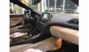 BMW 640i خليجي مالك واحد تشيكات وكالة فول اوبشن اربع فصوص كاميرات حساسات Display نفكيشن بصمة غراند كوبيه