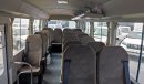 Toyota Coaster M/T 4.2L Diesel 22 seaters ,, window Blinds ,,big passengers Shelf and Fridge