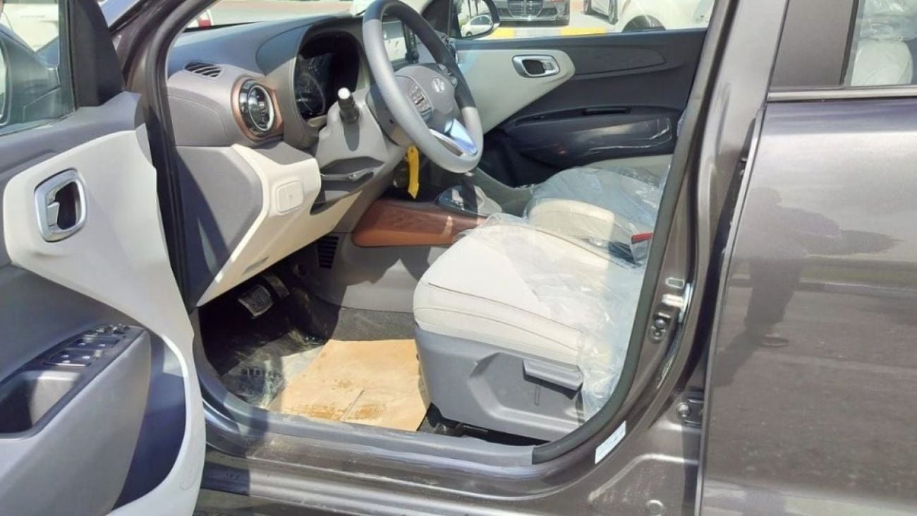 Hyundai Grand i10 1.2L Petrol Engine Sedan | Gray and Silver | 2024