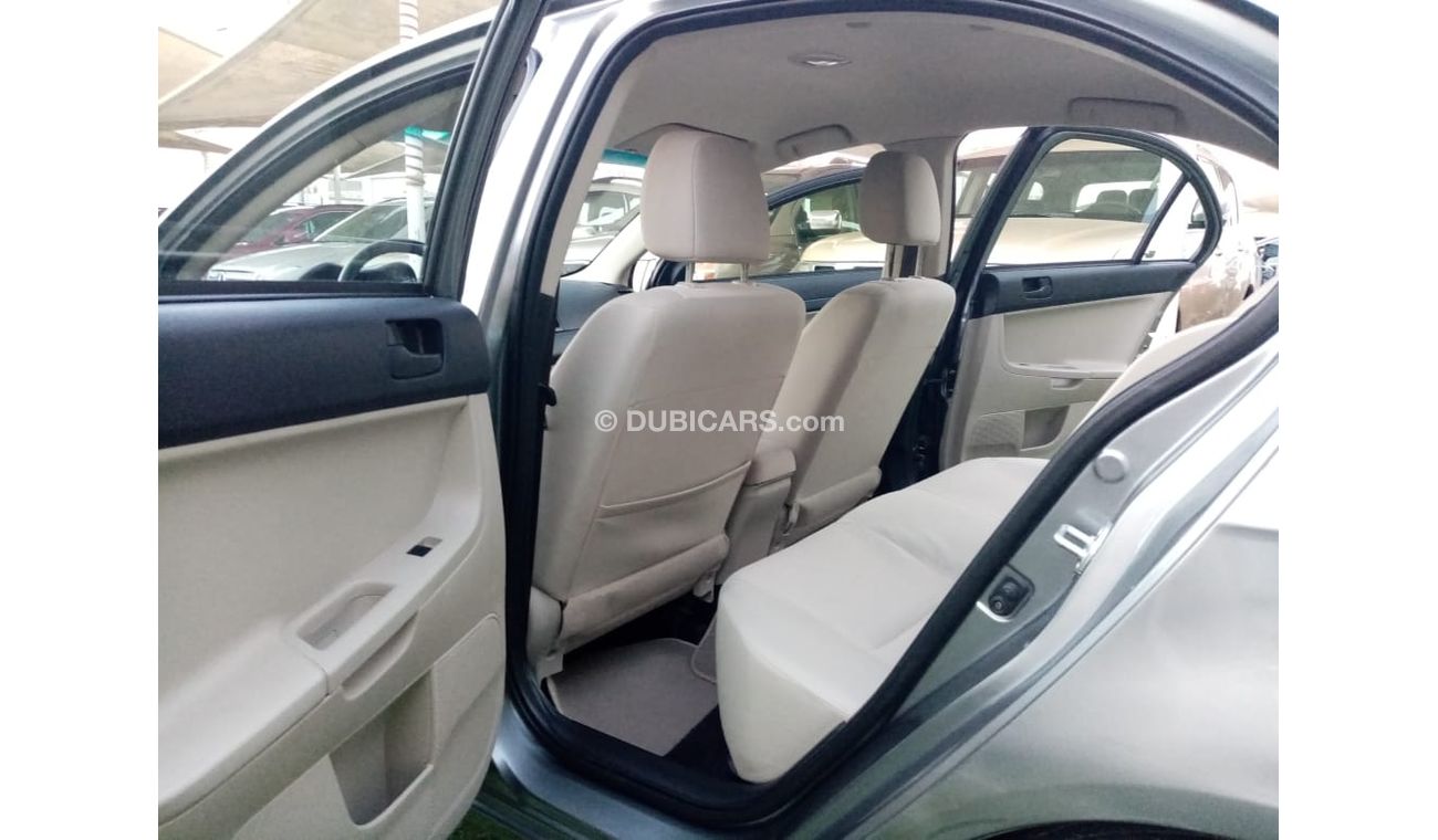 Mitsubishi Lancer Gulf gray color, inside beige without accidents, rear wing sensors, fog lights, in excellent conditi