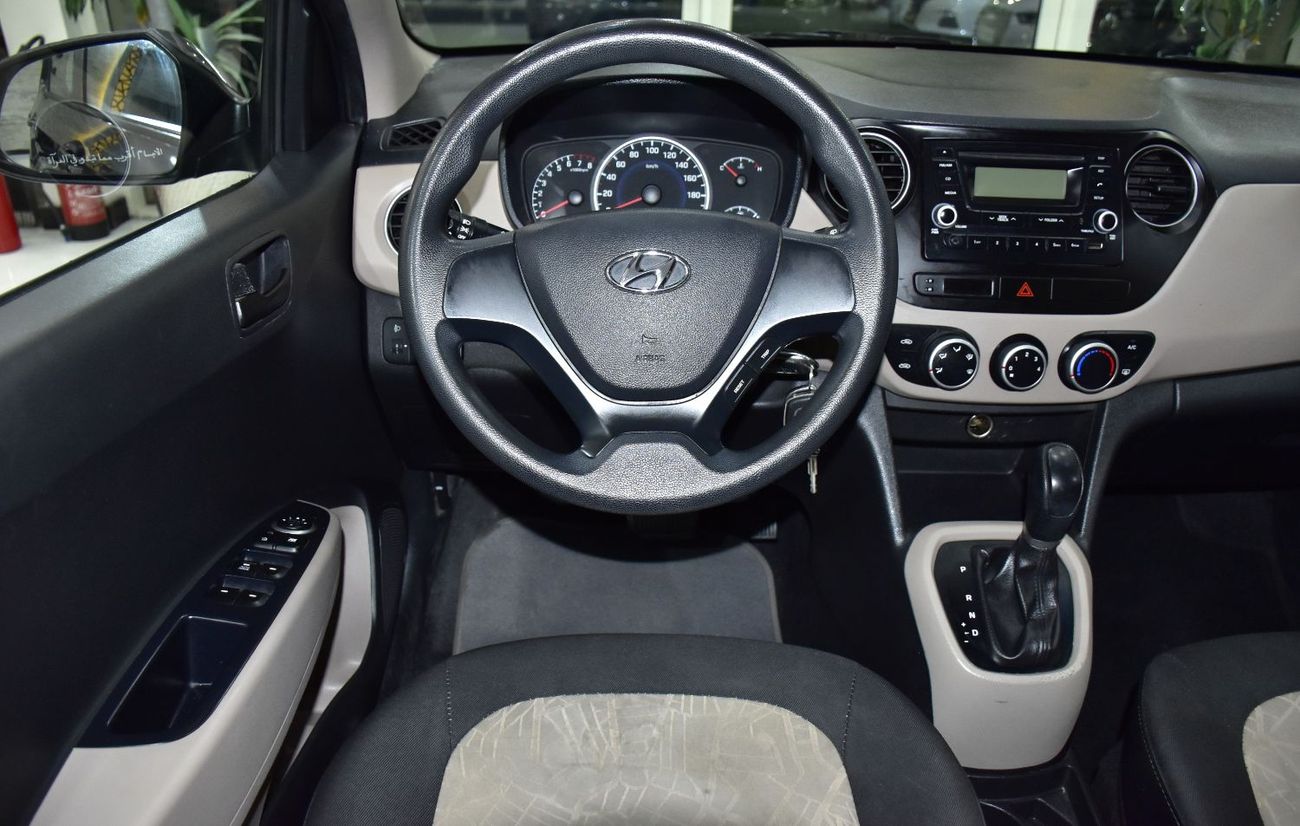 Hyundai Grand i10 EXCELLENT DEAL for our Hyundai Grand i10 ( 2018 Model ) in Red Color GCC Specs