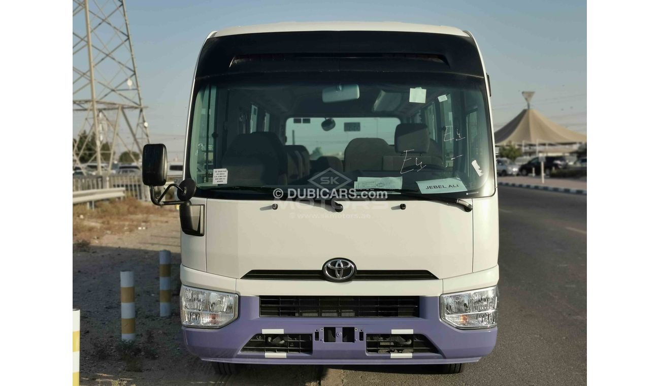 Toyota Coaster 2.7L PETROL, 17.5" TYRE, FABRIC SEATS, XENON HEADLIGHTS (CODE # TC01)