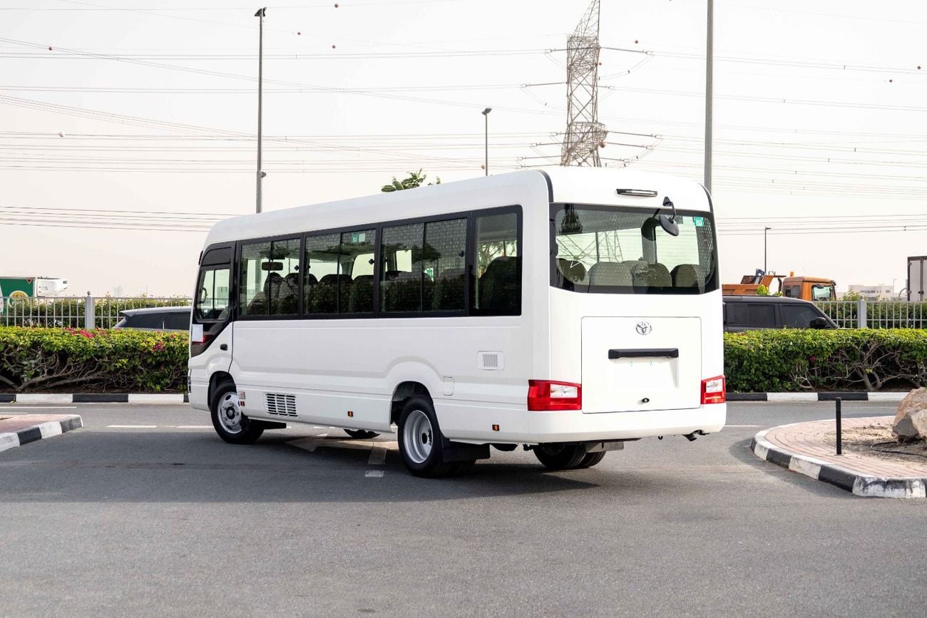 تويوتا كوستر 23 Seater 4.2L - White Inside Grey | Export Only