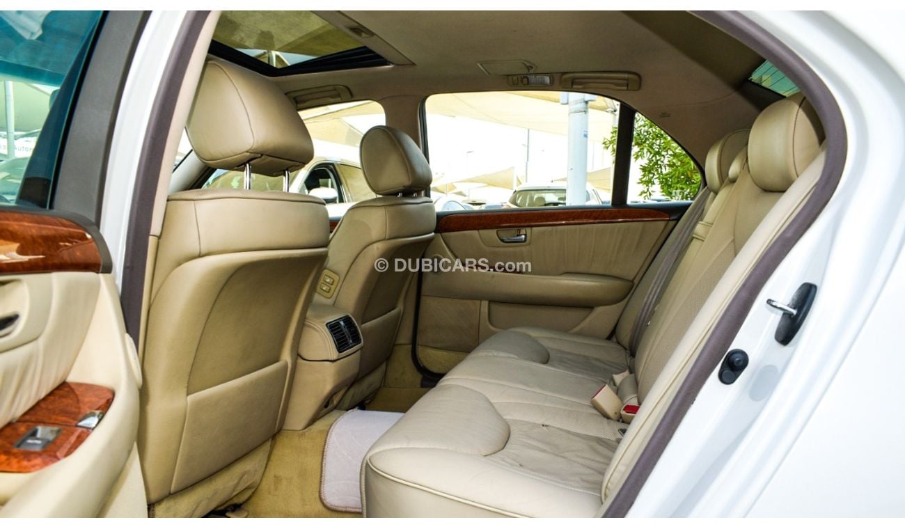 لكزس LS 430 وارد 1/2 الترا موديل 2006 لون أبيض فتحة جلد رنجات خشب مرايا كهرباء كرسي كهرباء بحالة ممتازة