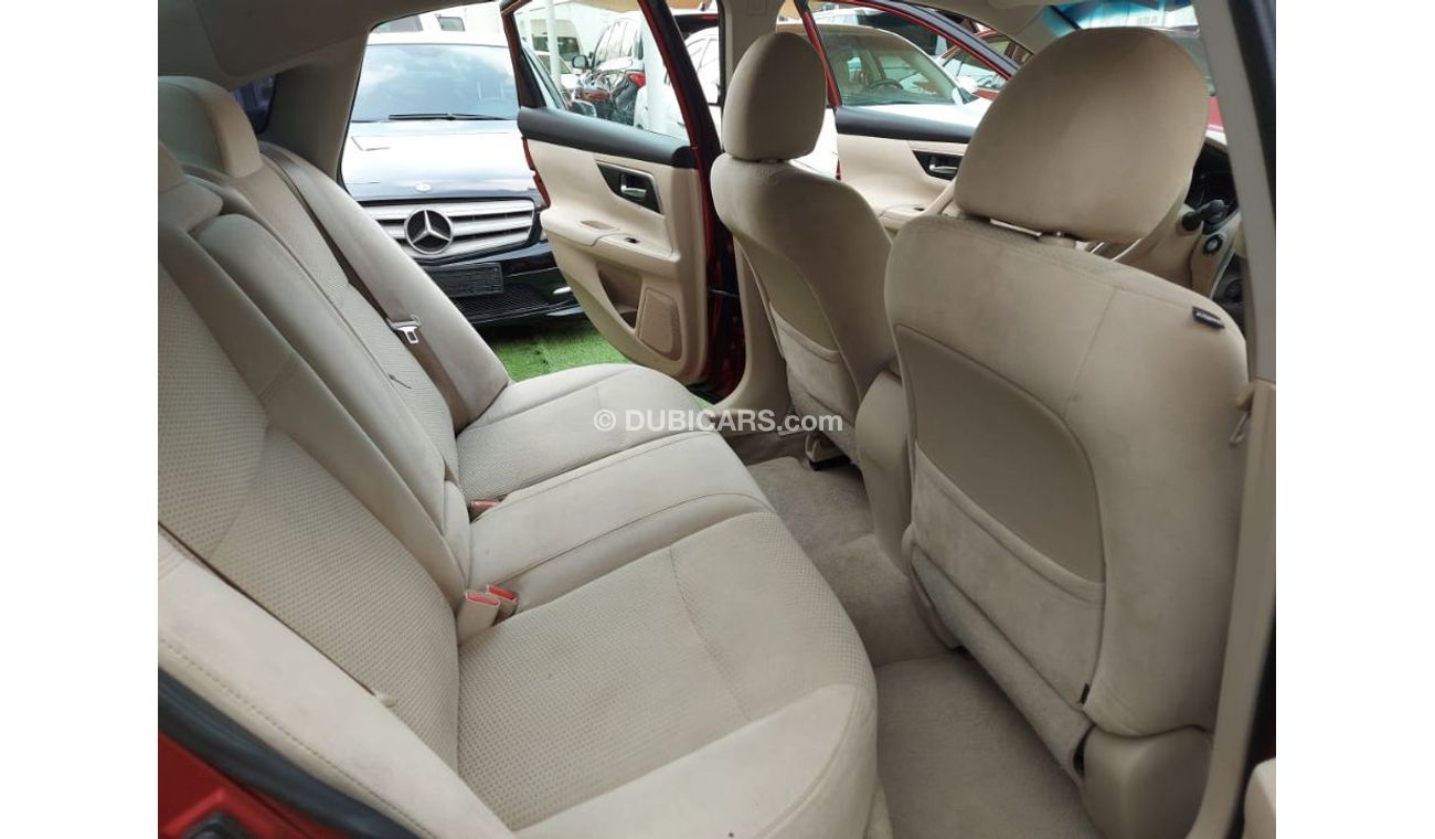 Nissan Altima 2014 model, American import, burgundy color, inside beige, cruise control, in excellent condition, y