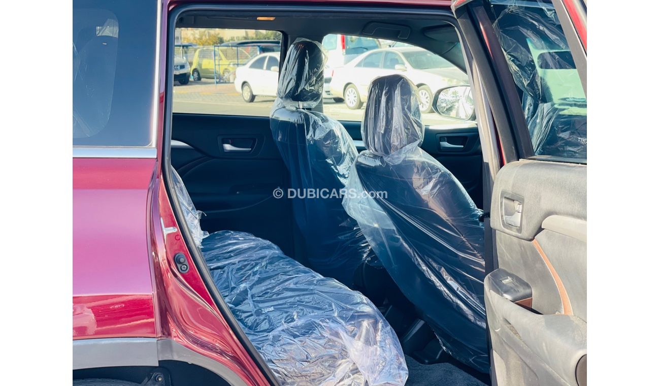 Toyota Kluger Toyota Kluger Petrol engine model FEB/2014 maroon color 7 seater  with push start and leather seats