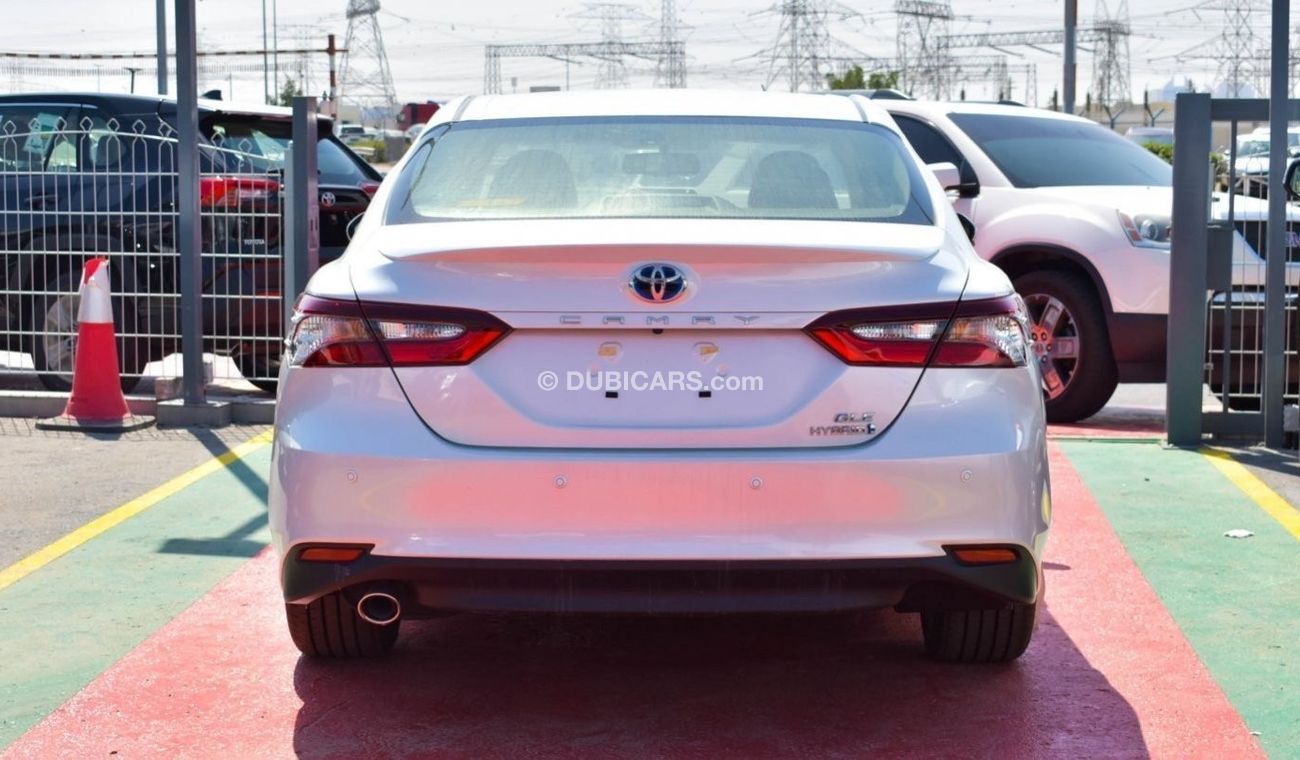 Toyota Camry GLE (( Hybrid )) 2.5L Petrol White color 4cyl , A/T, 4X2 FWD