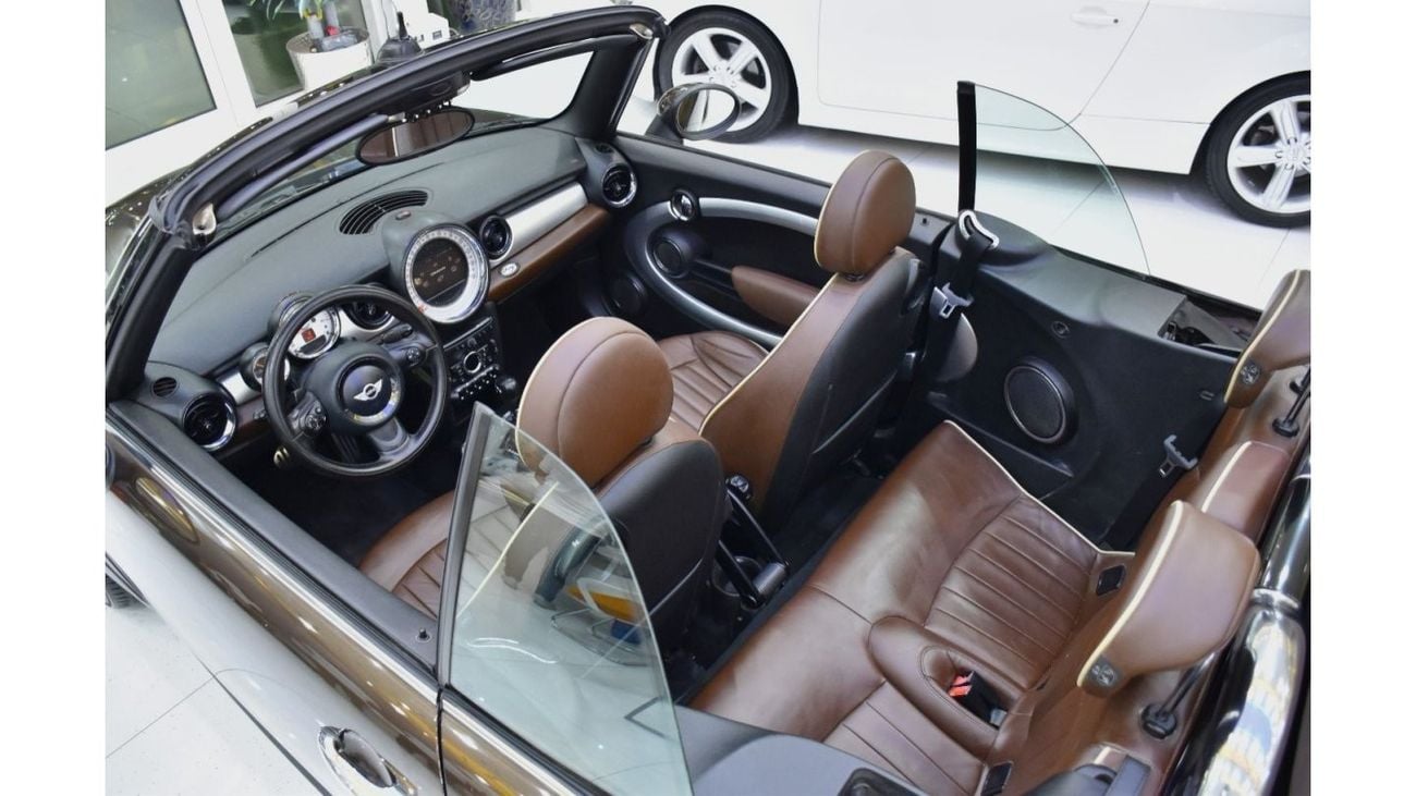 Mini Cooper S EXCELLENT DEAL for our Mini Cooper S Convertible ( 2011 Model ) in Brown Color GCC Specs