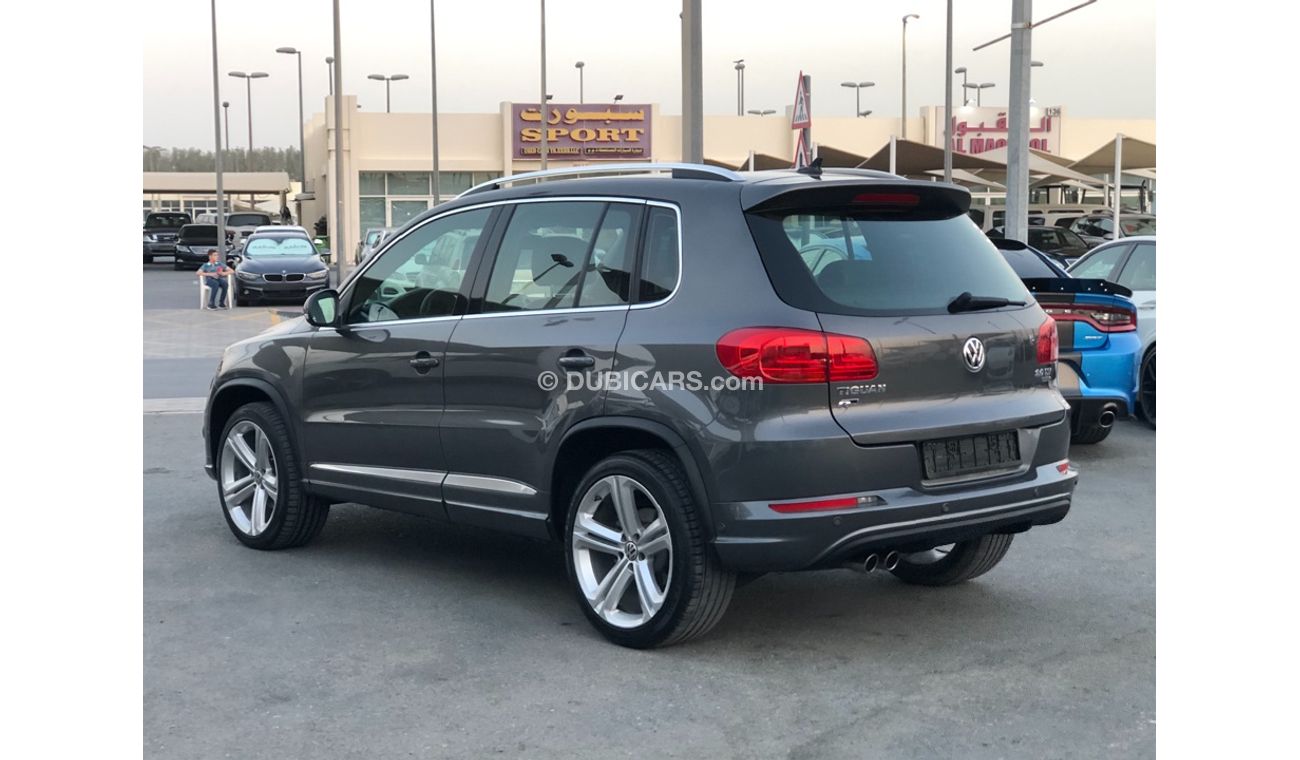 فولكس واجن تيجوان موديل 2014 خليجي فل مواصفات كراسي جلد ومثبت سرعه وتحكم كهربي كامل ونظام صوت ممتاز وكاميرا خلفيه