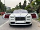 رولز رويس واريث 2015 Rolls Royce Wraith | GCC Specs | 6.6L V12 | 624 HP | 66k KM | WHITE/RED | Starlight Headliner |