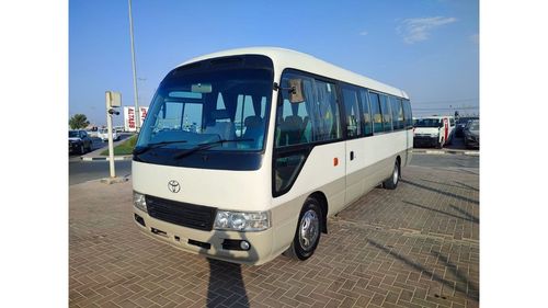 Toyota Coaster JTGEC538405000309 || 2008 WHITE GREY	4000	DIESEL	261785	RHD	MANUAL RIGHT HAND DRIVE.