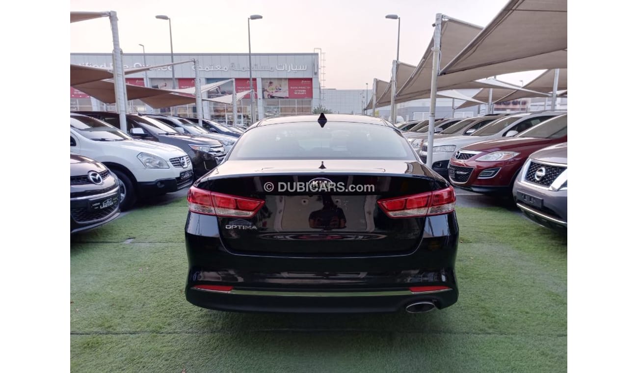 كيا أوبتيما وارد2016 رقم 2 رنجات  حساسات رنجات ومثبت سرعه وكاميرا خلفيه لاتحتاج الي مصاريف بحالة ممتازة