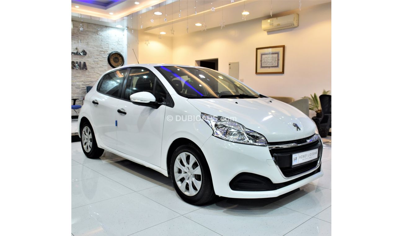 Peugeot 208 LOW MILEAGE! EXCELLENT DEAL for our Peugeot 208 2016 Model in White Color GCC Specs