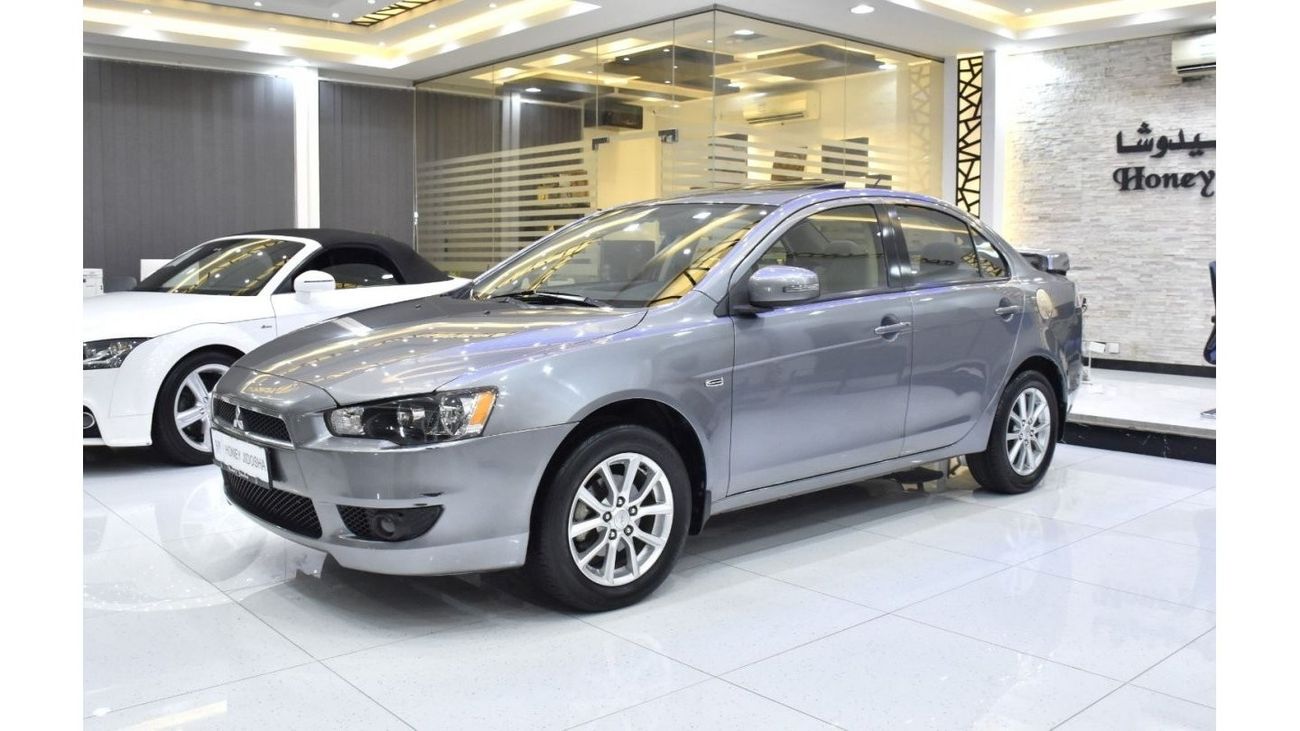 Mitsubishi Lancer EXCELLENT DEAL for our Mitsubishi Lancer GLS ( 2016 Model ) in Silver Color GCC Specs