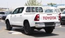 Toyota Hilux 2.4L diesel  . White 2024 model, M/T Wide body with Chrome bumper