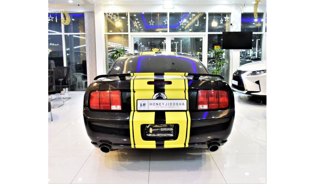 Ford Mustang ONLY 129000 KM! FORD MUSTANG GT 2005 Model in Black with Yellow Stripes Color! GCC Specs