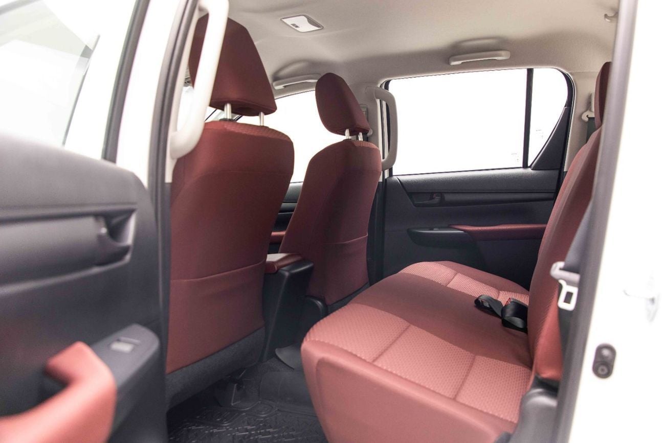 Toyota Hilux DLX 2.4L - Super White Inside Red | Export Only
