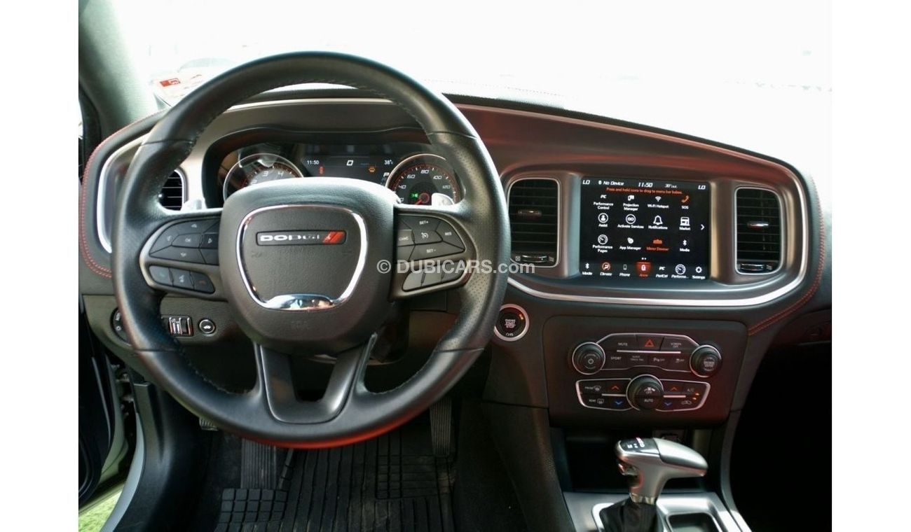 Dodge Charger R/T The Charger RT is powered by a 5.7-liter HEMI V8 engine that produces 370 horsepower and 535 Nm