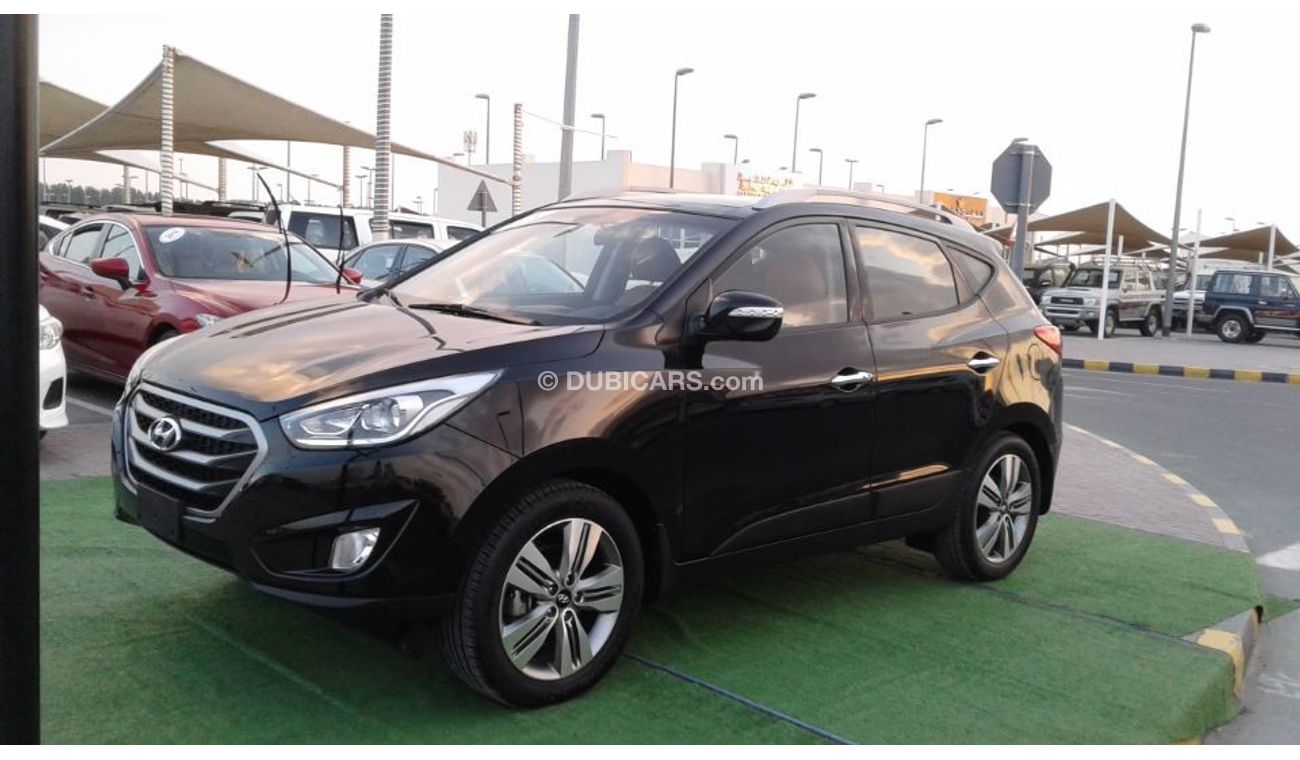 Hyundai Tucson HYUNDAI TUCSON 2015 BLACK NO PIANT NO ACCIDENT KHALIGE FULL OPTION NUMBER 1