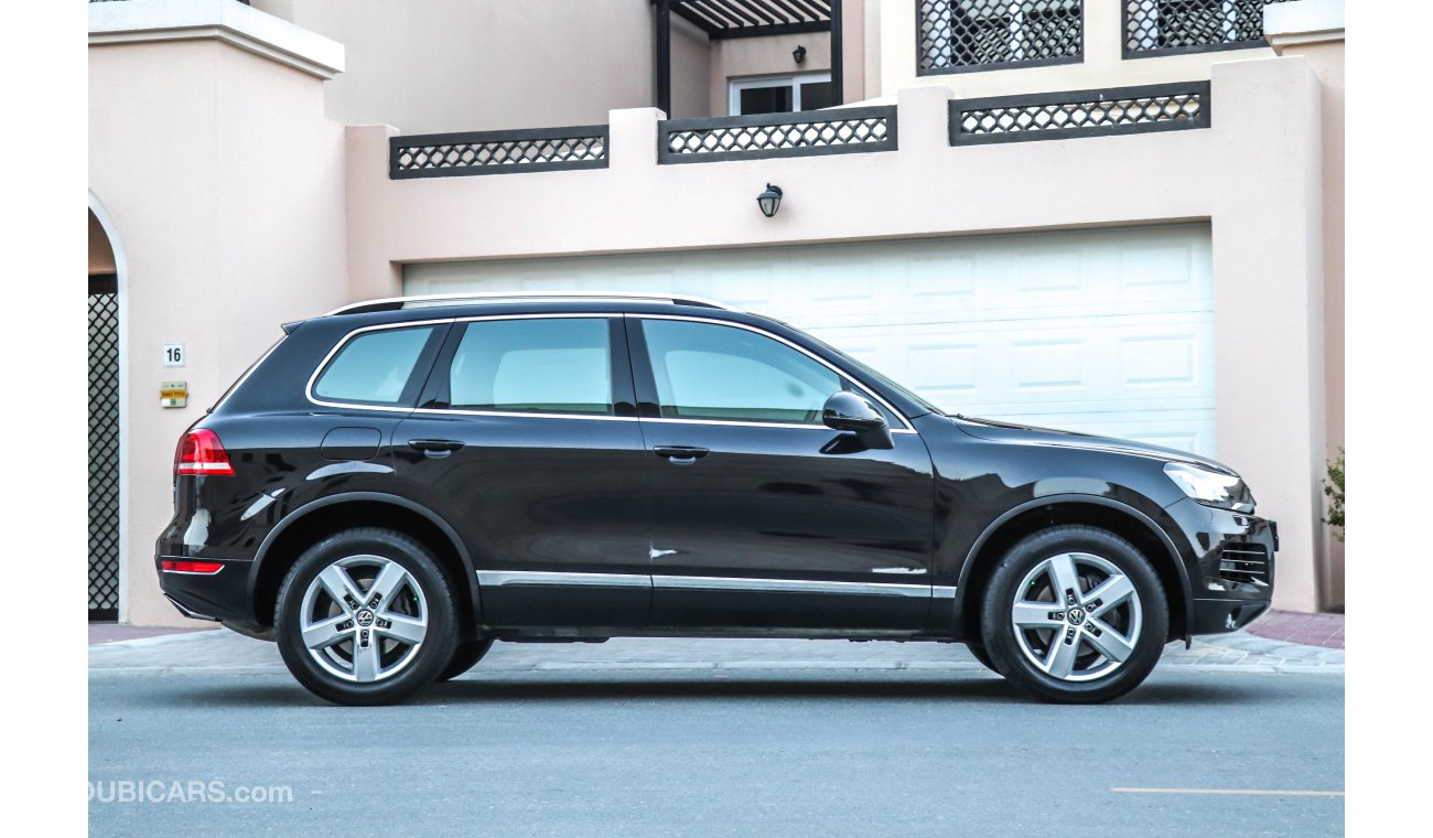 Volkswagen Touareg SEL 2014 GCC under Warranty with Zero downpayment.