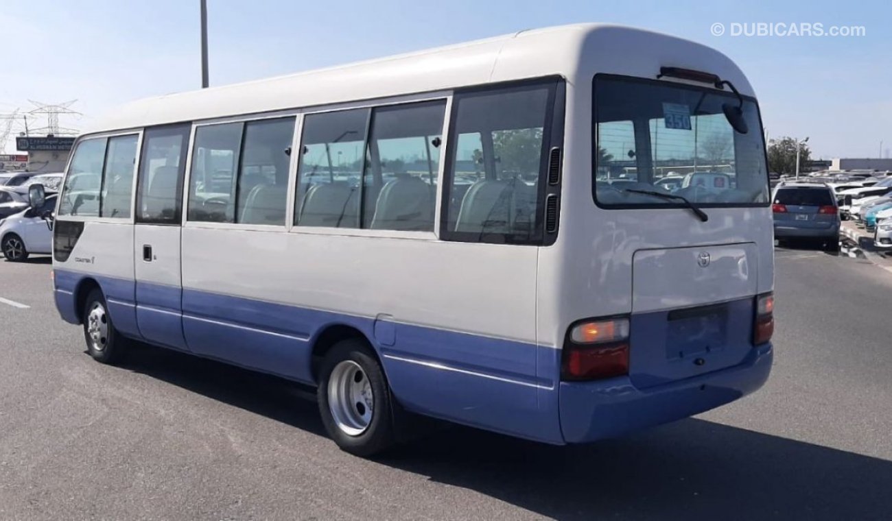 تويوتا كوستر TOYOTA COASTER RIGHT HAND 2002 MODEL 1HZ ENGINE 4.2CC MANUAL TRANSMISSION 29 SEAT DOUBLE TIRE