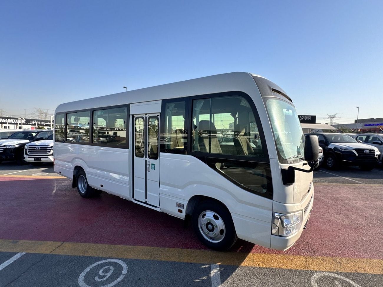 Toyota Coaster 2026 TOYOTA COASTER HIROOF 4.0L DIESEL M/T 22 SEATER 3PELR LUGGAGE RACK BRAND NEW 0KM