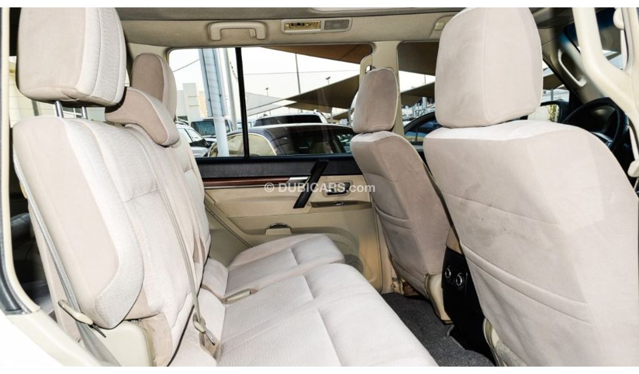 ميتسوبيشي باجيرو خليجى موديل 2007 صبغ وكاله لون ابيض داخل بيج رقم واحد فتحه مثبت تحكم خشب رنجات حساسات بحاله ممتا زه