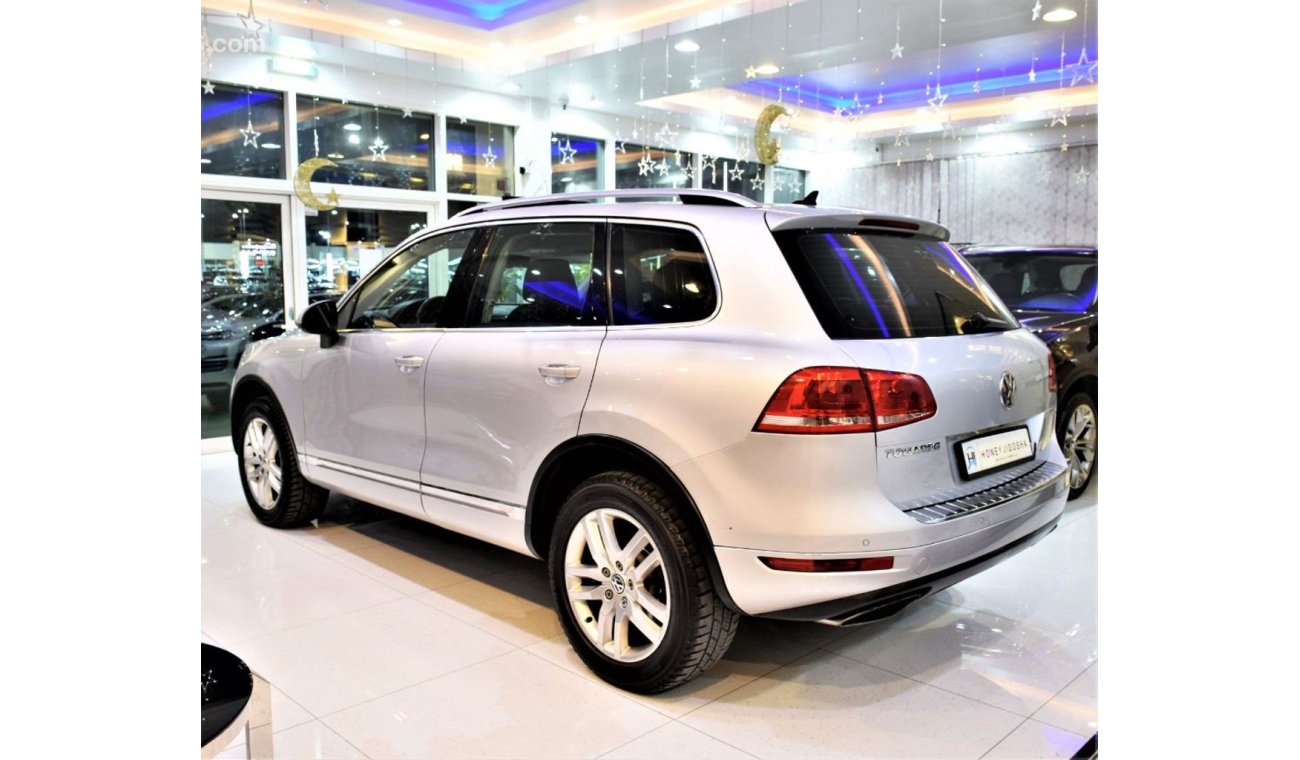 Volkswagen Touareg WITH SERVICE HISTORY Volkswagen Touareg 2011 Model! GCC Specs Silver Color!