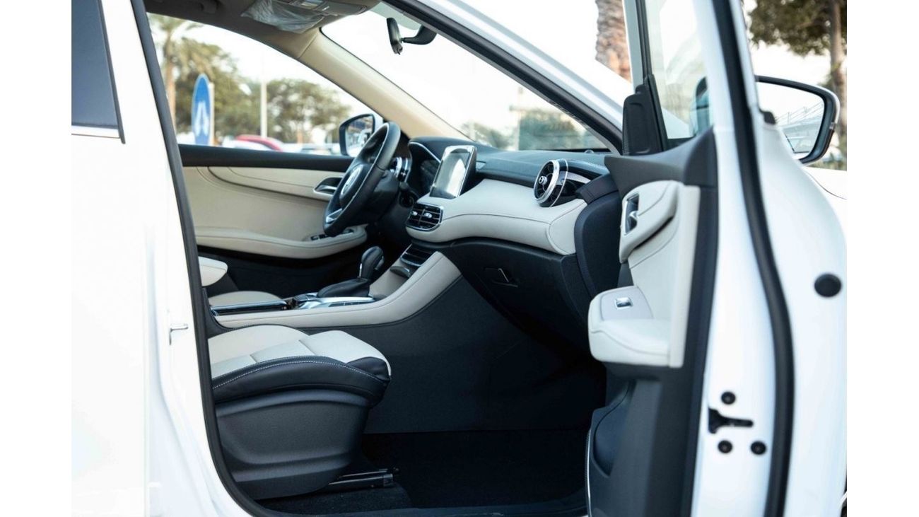 أم جي HS 2023 إم جي HS 4X4 2.0T LUXURY - أبيض لؤلؤي من الداخل بني | سعر التصدير