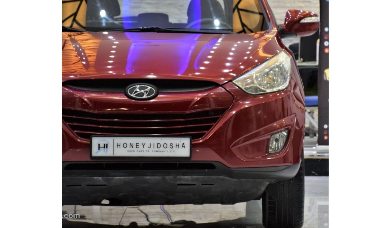 Hyundai Tucson GL EXCELLENT DEAL for our Hyundai Tucson 4WD ( 2012 Model! ) in Red Color! GCC Specs