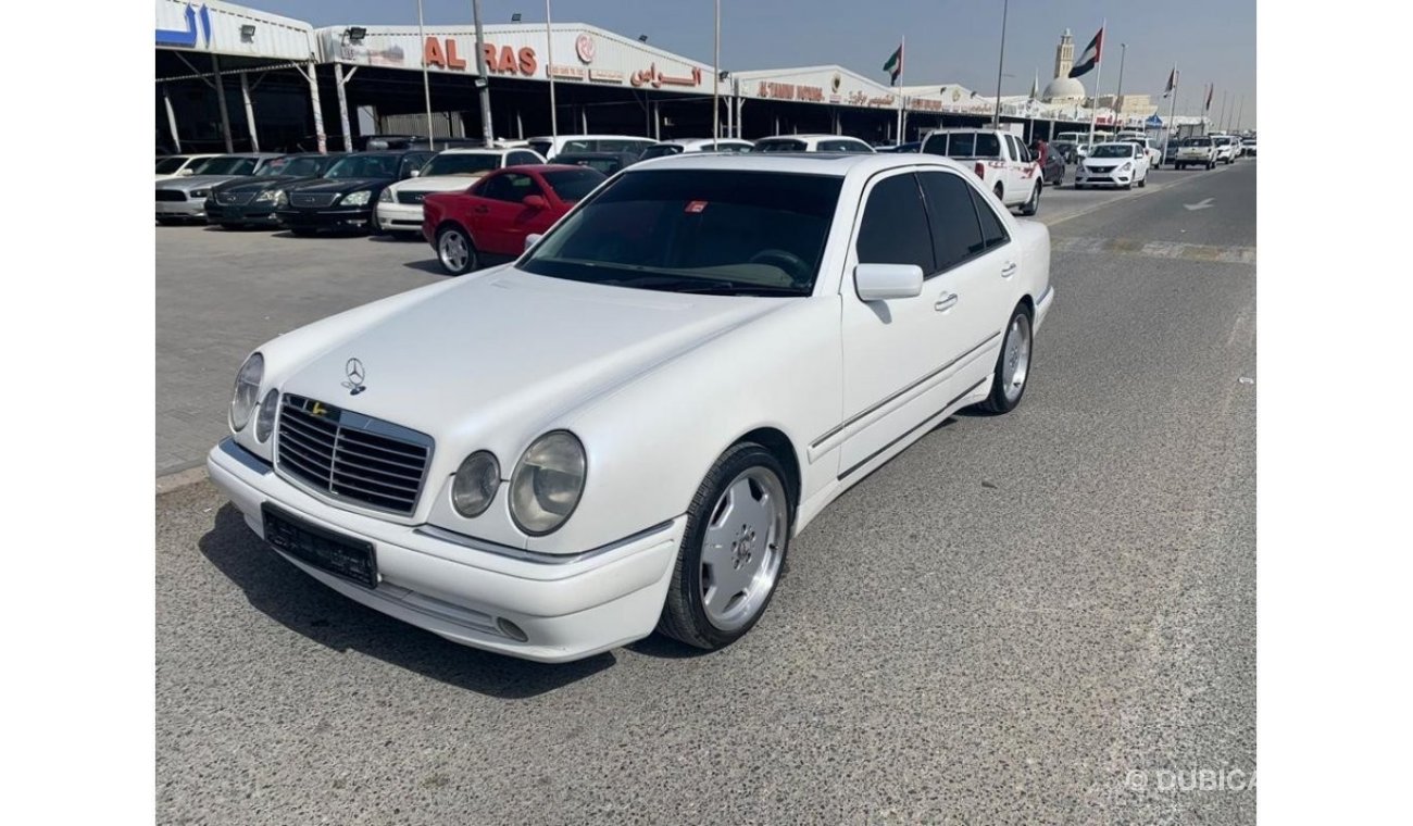 Mercedes-Benz E 320 1998 American model, 6-cylinder kit AMG 55, white inside beige, mileage 198000