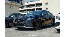 Toyota Camry XSE Hybrid Black / Red Interior